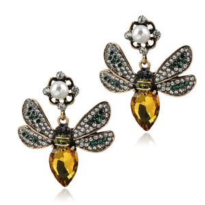 Aretes de bicho amarillo