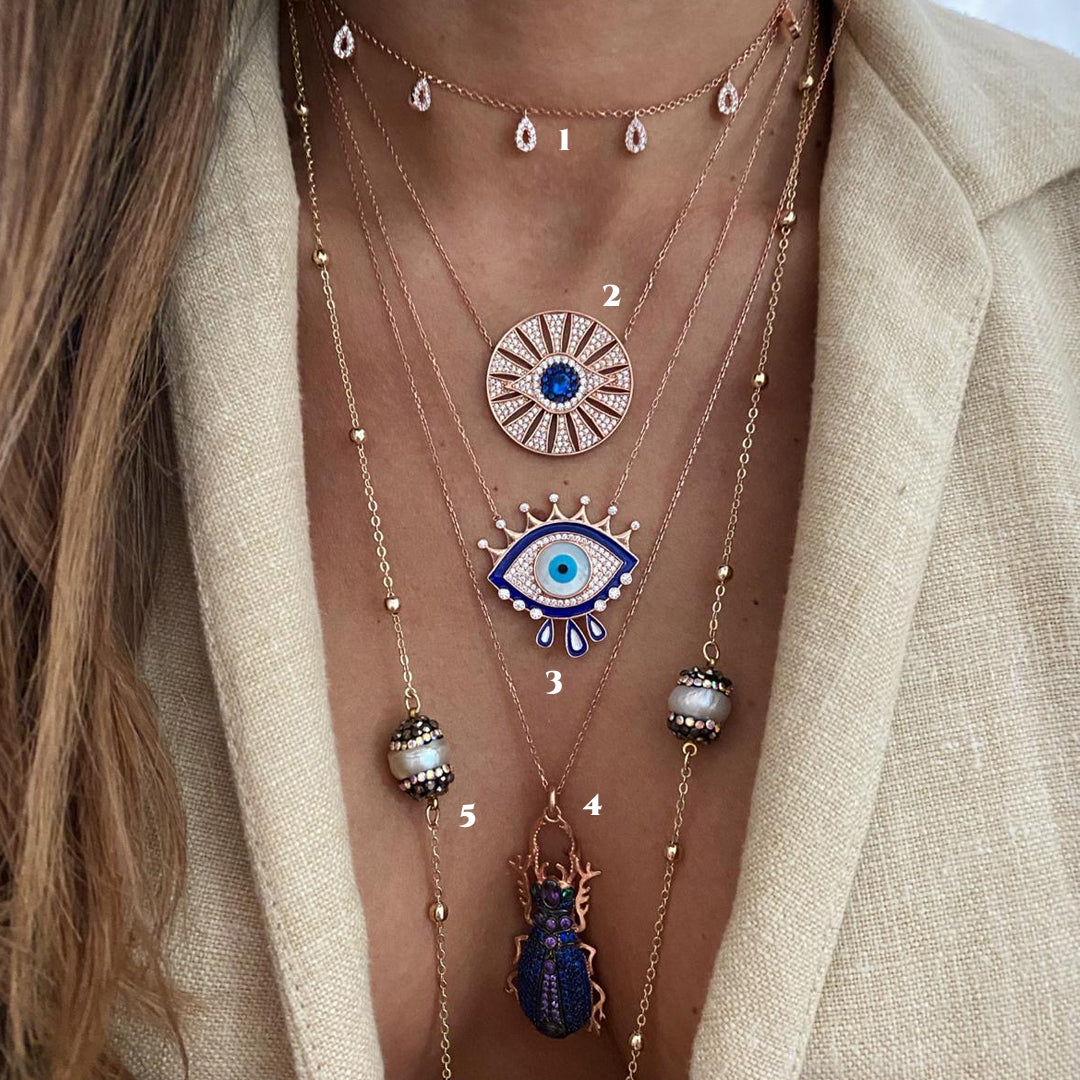 Oriente - Gotas - Sol - Ojo Turco - Escarabajo - Esferas