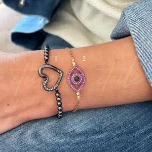 Pulsera - Corazón Negro - Ojo Rosa